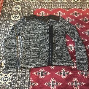 Chic Black and White Knit Sweater with Leather Accents